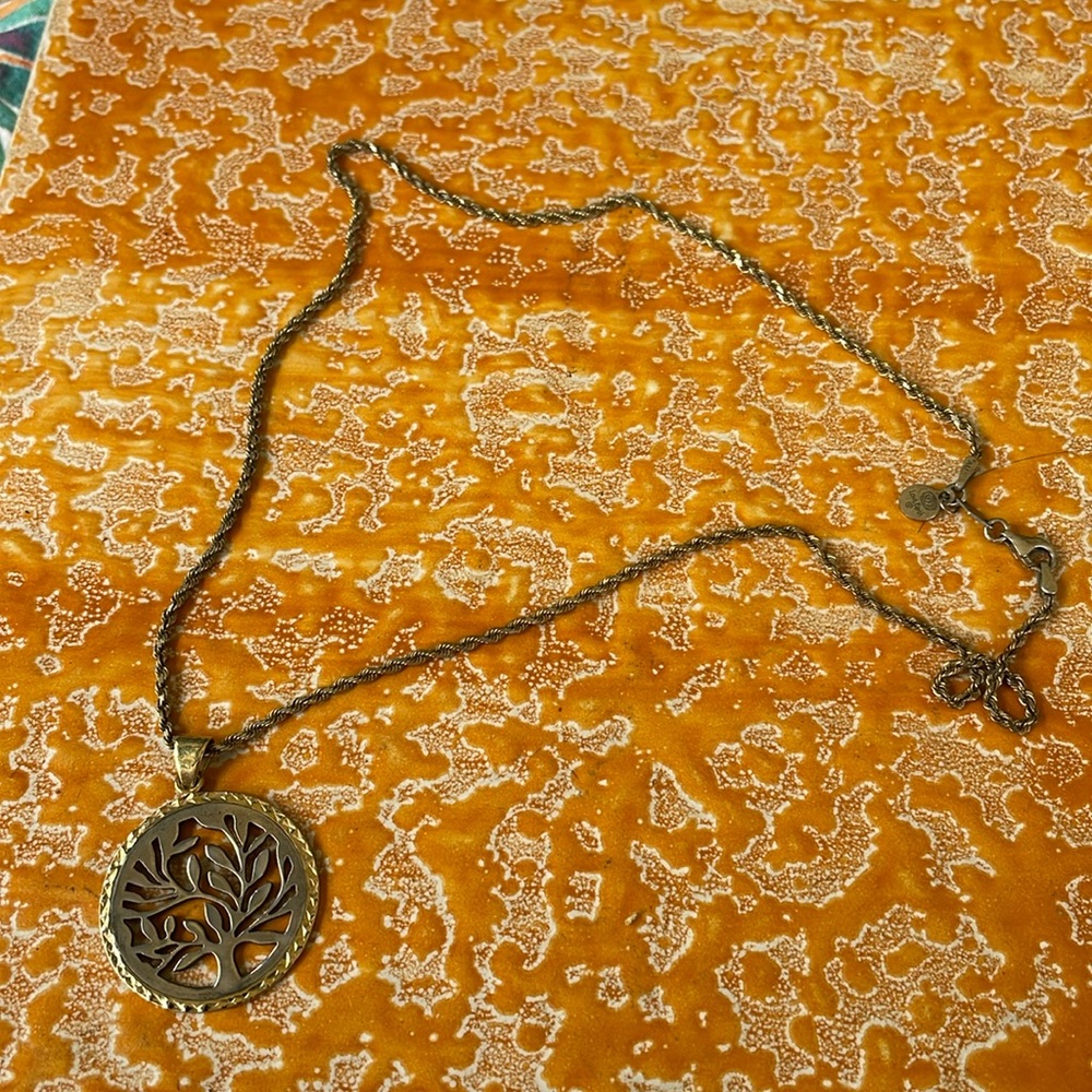 Love Earth brand two-tone tree pendant